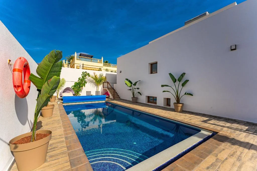 Private pool with decorative plants